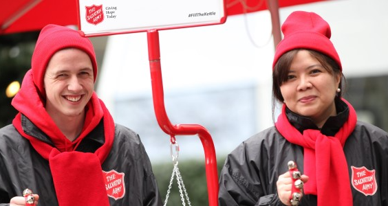 Christmas kettle volunteers smiling