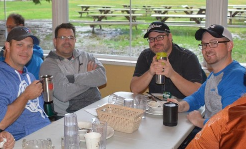 A group of people having food together