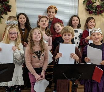 Children performing during their program