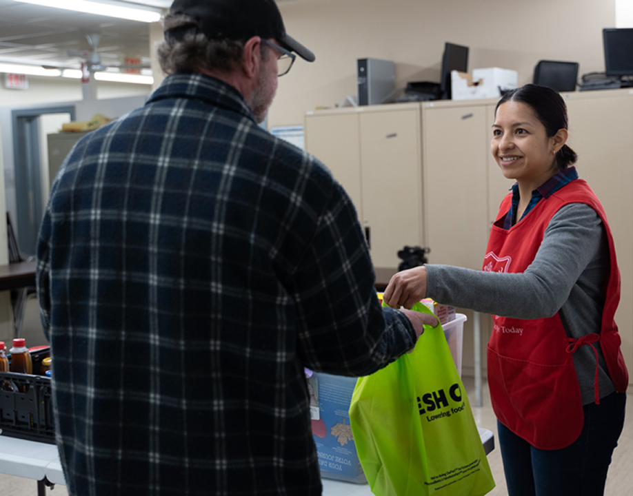A volunteer helping a client